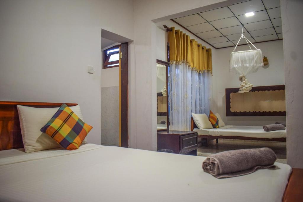 Postel nebo postele na pokoji v ubytování Sea Zone Villa