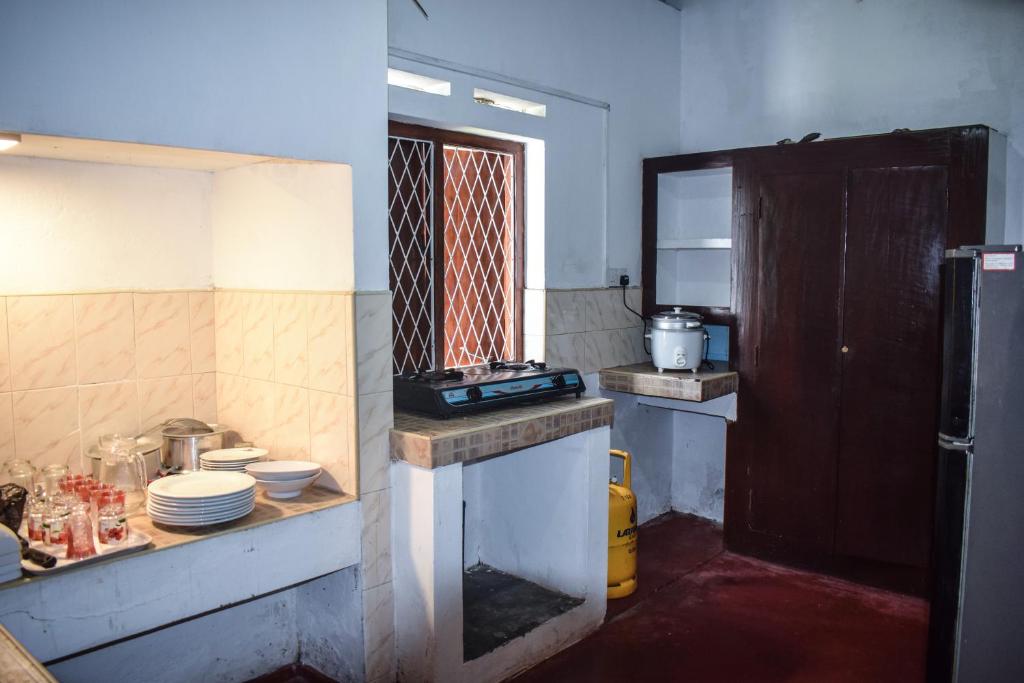 Kuchyň nebo kuchyňský kout v ubytování Sea Zone Villa