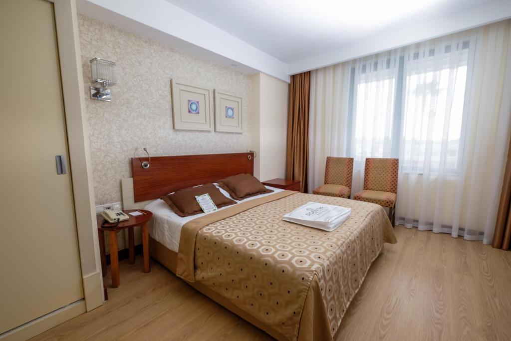 Postel nebo postele na pokoji v ubytování Side Star Beach Hotel - Ultra All Inclusive