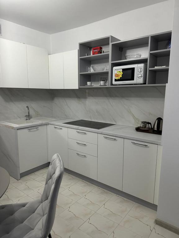 Cucina o angolo cottura di Gray Apartment