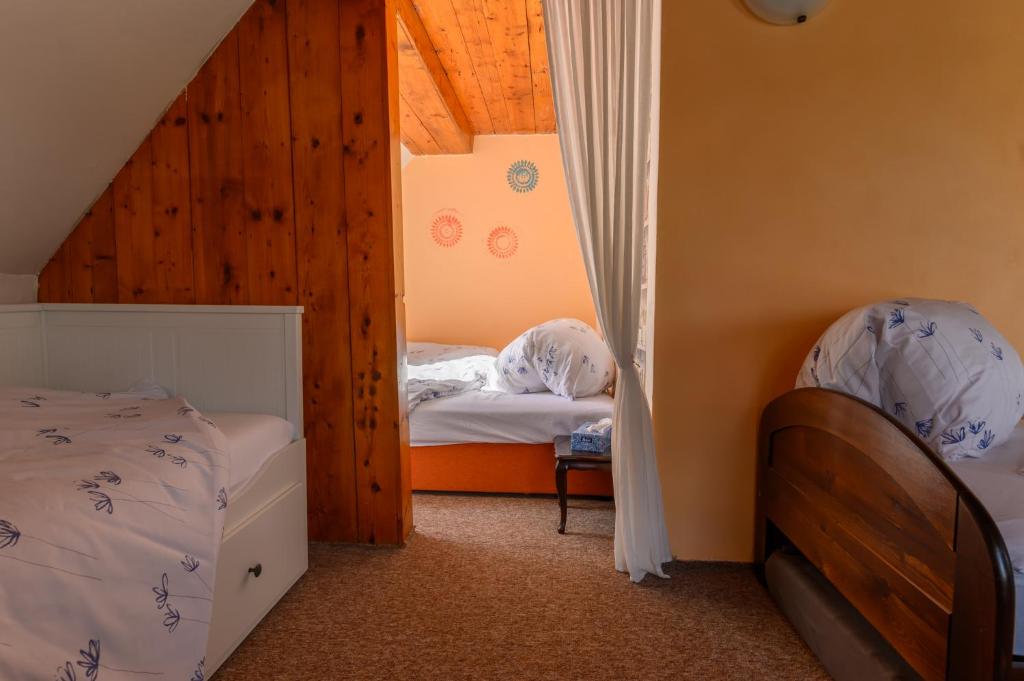 Postel nebo postele na pokoji v ubytování Kovářská vyhlídka
