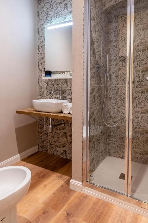 Koupelna v ubytování Gian Paul Hotel