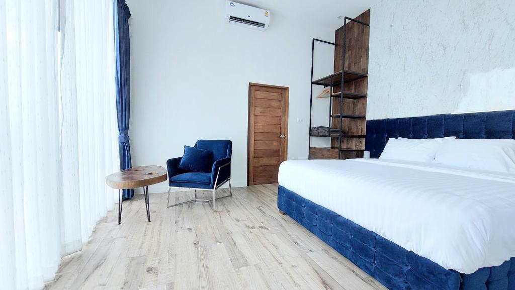 Postel nebo postele na pokoji v ubytování Green Lung Pool Villas Bangkok