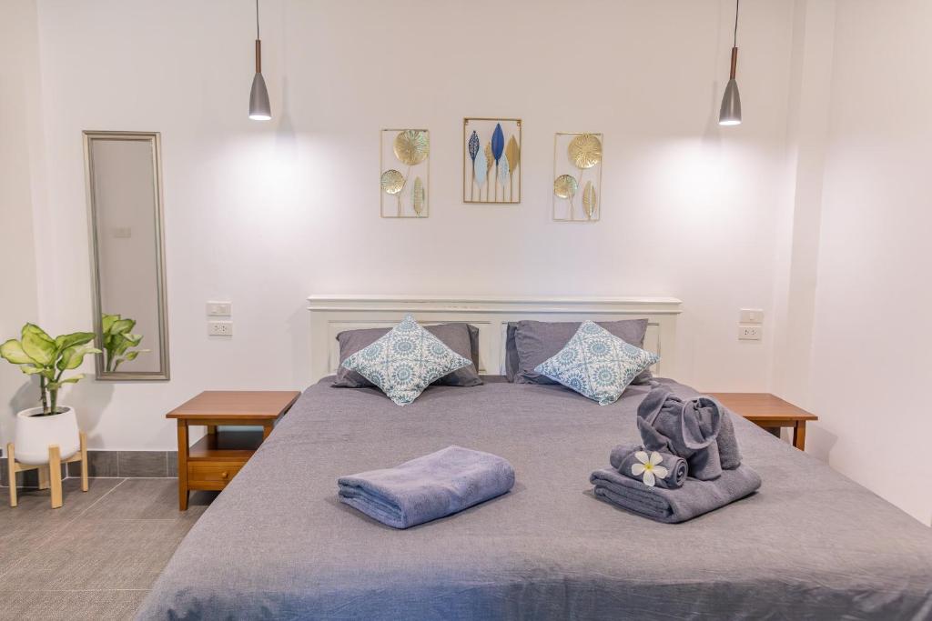 Postel nebo postele na pokoji v ubytování Apple Villas