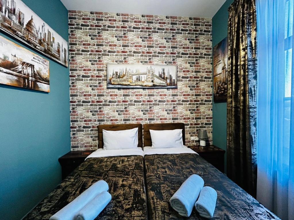 Postel nebo postele na pokoji v ubytování Hotel Zerta Old Tbilisi