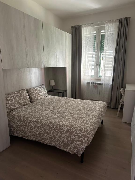 Postel nebo postele na pokoji v ubytování Da Robi Camera con bagno privato esterno