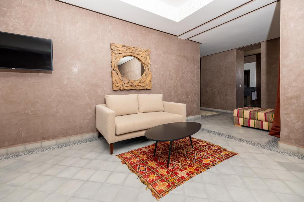 TV a/nebo společenská místnost v ubytování Fellah Hotel