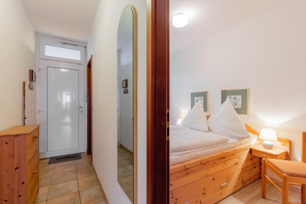 Postel nebo postele na pokoji v ubytování Grömitz-Center Whg 20