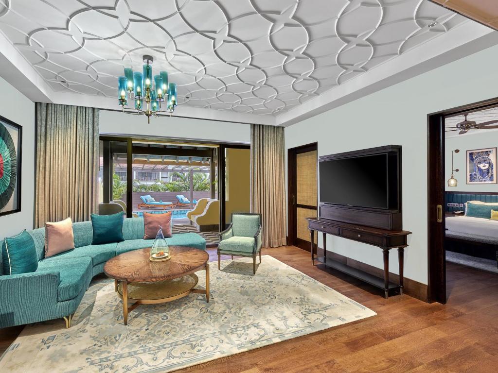 Uma televisão e/ou sistema de entretenimento em ITC Grand Goa, a Luxury Collection Resort & Spa, Goa