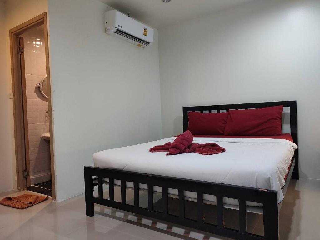 Postel nebo postele na pokoji v ubytování Kitty Guesthouse