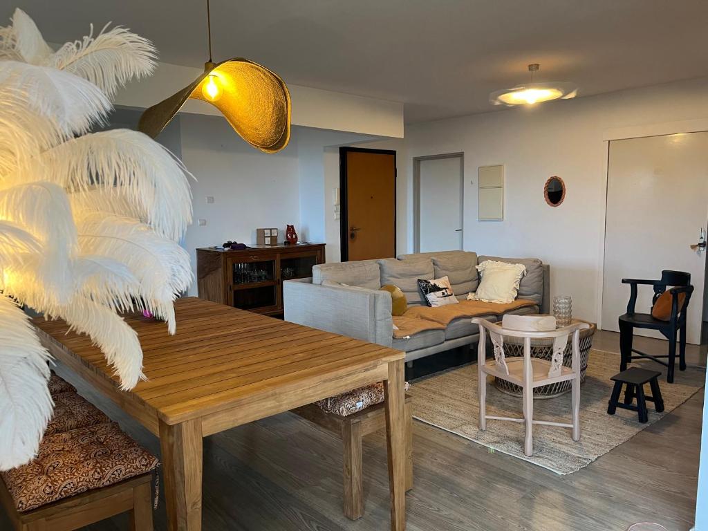 Predel za sedenje v nastanitvi Aprile des îles .Appartement avec une jolie vue