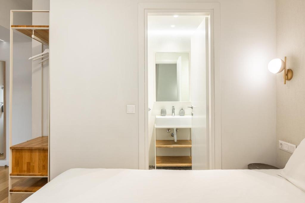 Posteľ alebo postele v izbe v ubytovaní Syntagma Apartments by Olala Homes