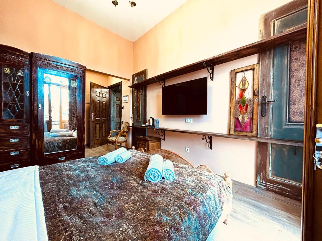Postel nebo postele na pokoji v ubytování Hotel Zerta Old Tbilisi