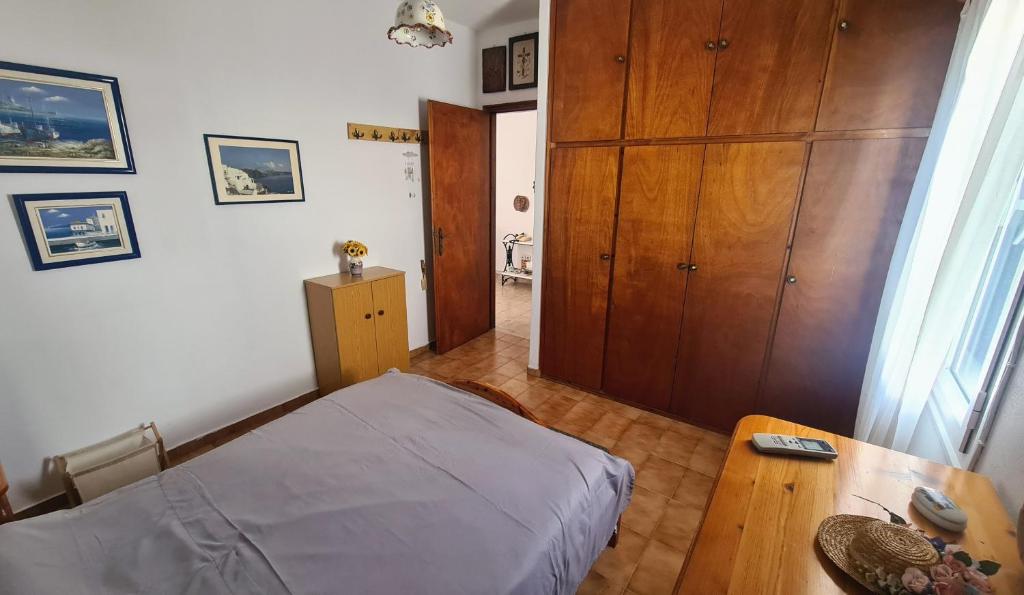 Postel nebo postele na pokoji v ubytování Captain's George