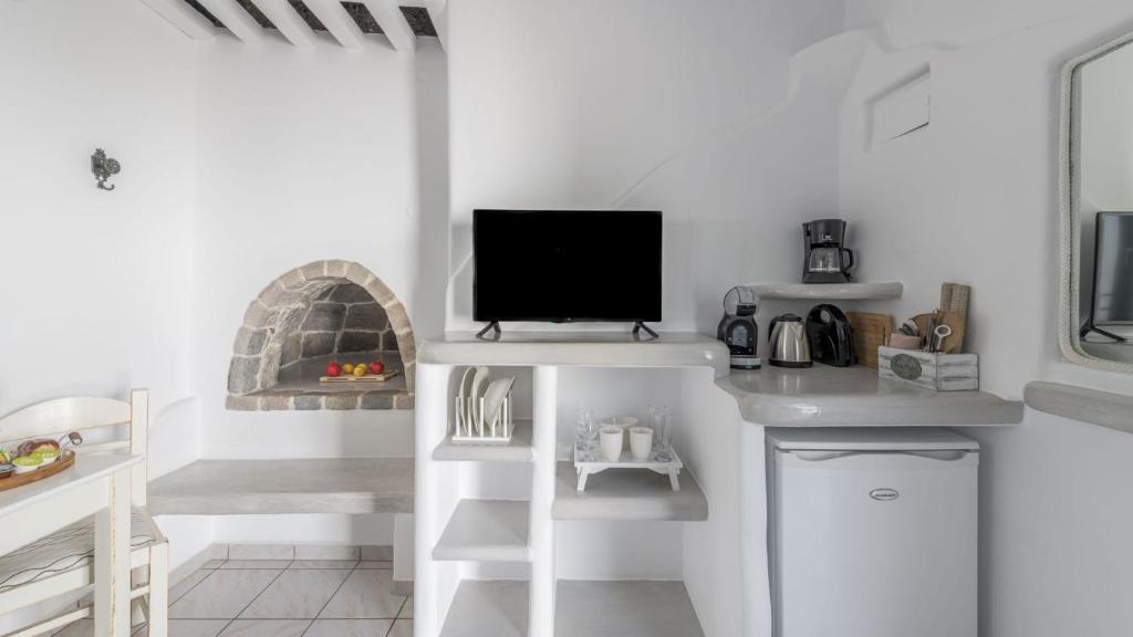 Kuchyň nebo kuchyňský kout v ubytování Floras Rooms