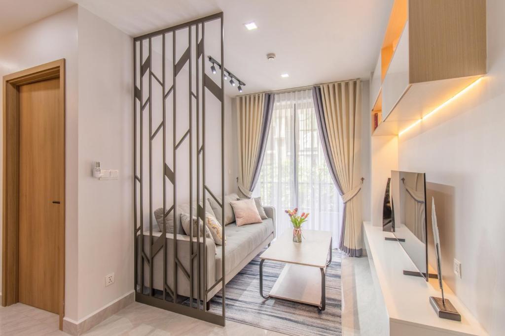 Postel nebo postele na pokoji v ubytování Sky Park Condotel & Residence