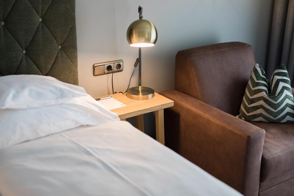 Voodi või voodid majutusasutuse Nationalpark Lodge Grossglockner toas