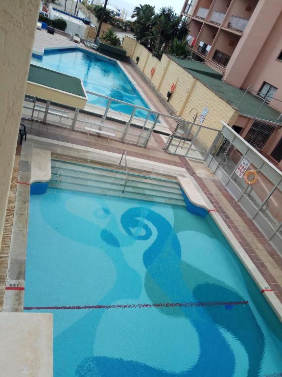Bazén v ubytování Esplendido APARTAMENTO, CARIHUELA EDIFICIO EL REMO, PRIMERA LÍNEA nebo v jeho okolí