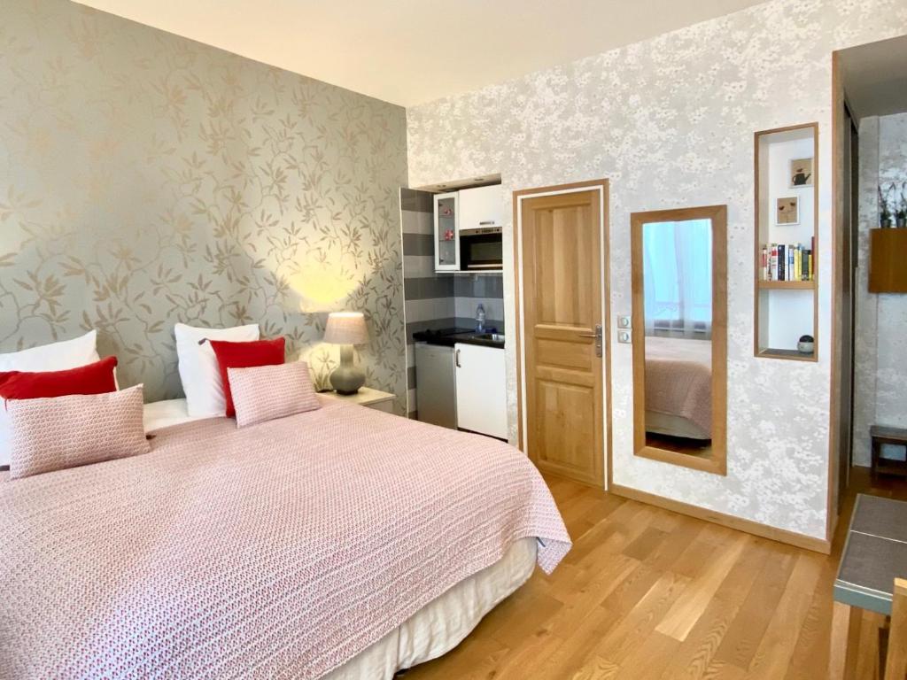 Postel nebo postele na pokoji v ubytování CamParis - B&B - Chambre d'hôtes