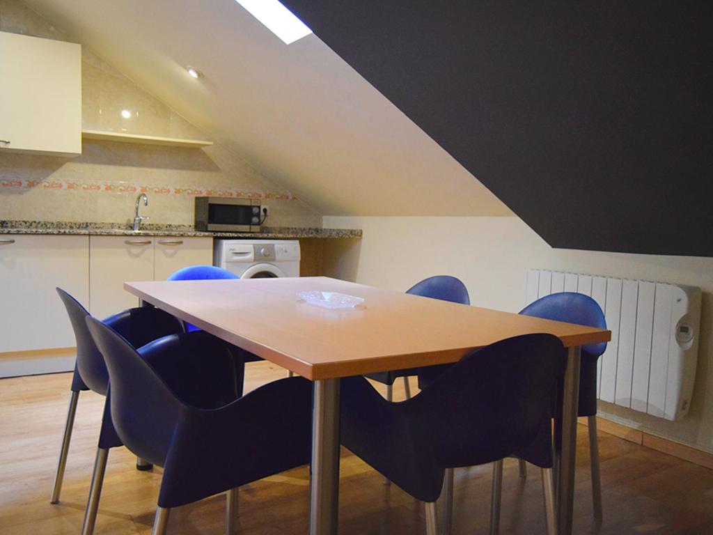 Kuchyň nebo kuchyňský kout v ubytování Apartamentos Pantebre 3000