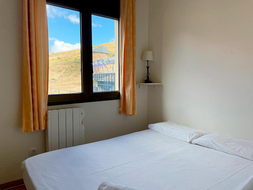 Postel nebo postele na pokoji v ubytování Apartamentos Pantebre 3000