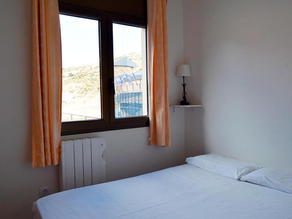 Postel nebo postele na pokoji v ubytování Apartamentos Pantebre 3000