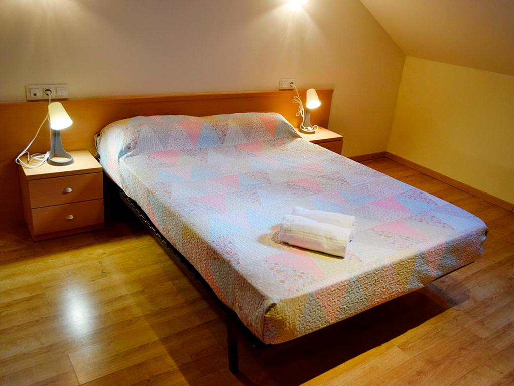 Postel nebo postele na pokoji v ubytování Apartamentos Pantebre 3000