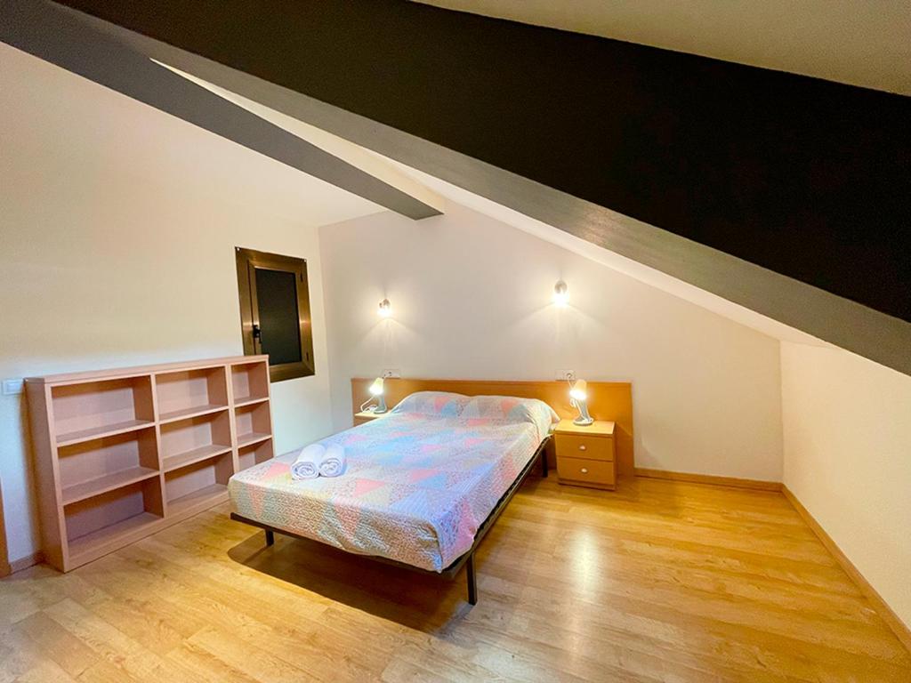 Postel nebo postele na pokoji v ubytování Apartamentos Pantebre 3000