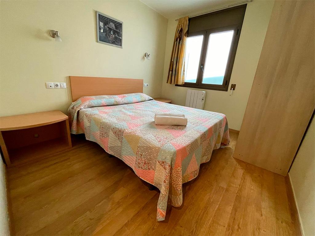Postel nebo postele na pokoji v ubytování Apartamentos Pantebre 3000