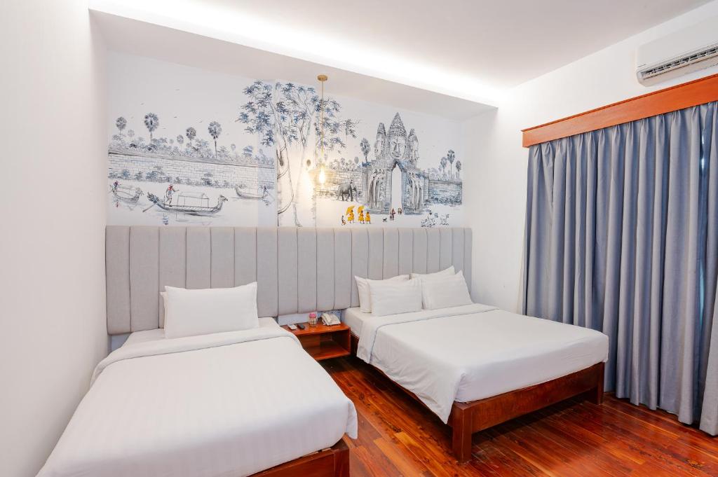 Postel nebo postele na pokoji v ubytování Victoria Central Residence