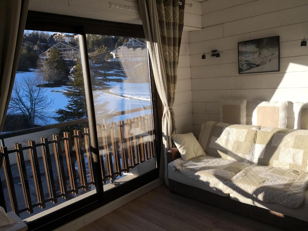 Posezení v ubytování Joli Studio à la Montagne