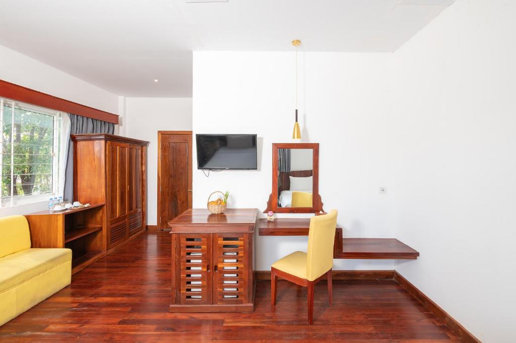 TV a/nebo společenská místnost v ubytování Victoria Central Residence