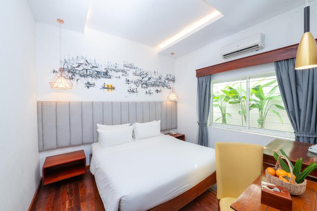 Postel nebo postele na pokoji v ubytování Victoria Central Residence