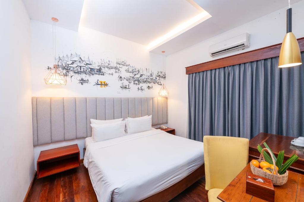 Postel nebo postele na pokoji v ubytování Victoria Central Residence