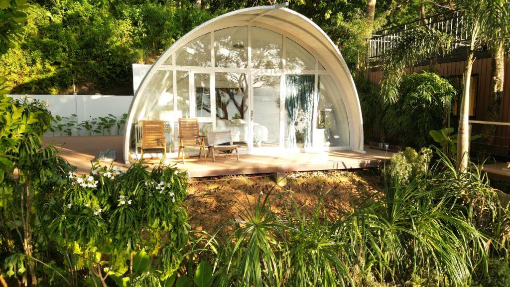 a white gazebo with two chairs and a table at Unique Stays at Karuna El Nido - The Cocoon in El Nido