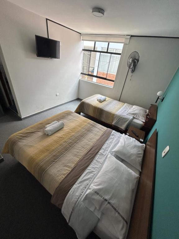 Postel nebo postele na pokoji v ubytování Dream Place Trujillo
