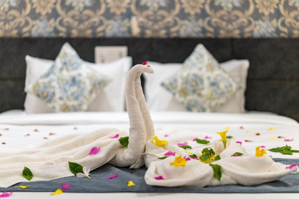 Postel nebo postele na pokoji v ubytování Vesta Avtar Resort Pushkar