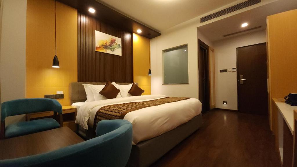 Postel nebo postele na pokoji v ubytování Prudential Hotel Nepal