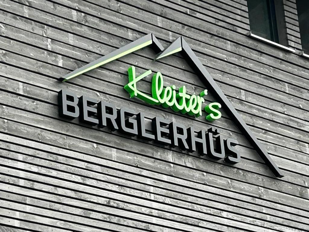 a sign on the side of a building at Kleiter´s BERGLERGHÜS in Blaichach