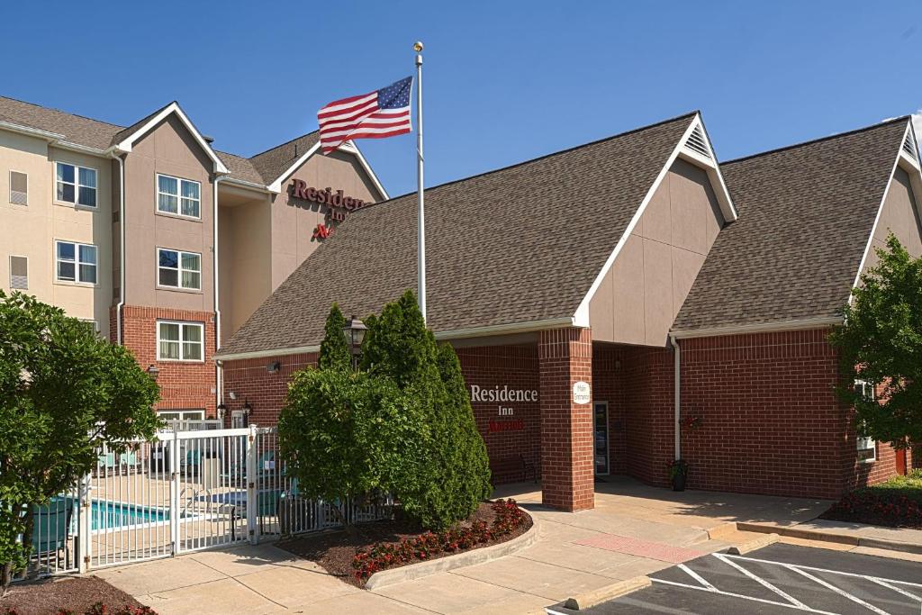 a building with an american flag on top of it at Residence Inn Chantilly Dulles South in Chantilly
