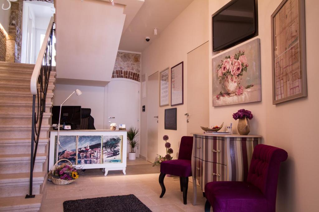 TV a/nebo společenská místnost v ubytování Hotel Heritage Forza