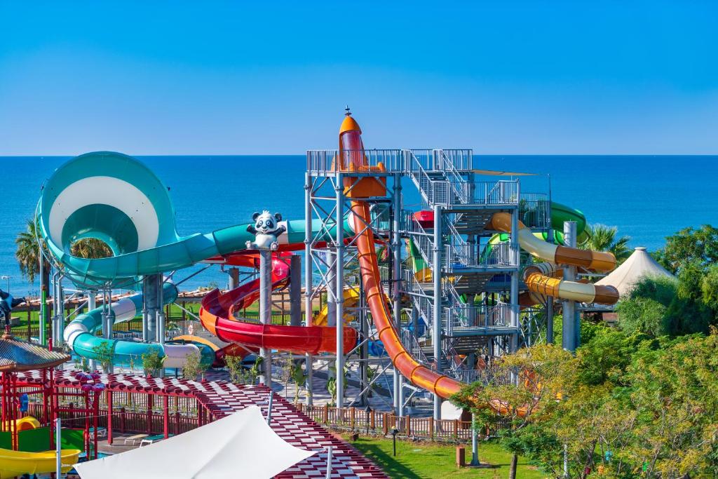 a large water park with a water slide at Megasaray Club Belek in Belek