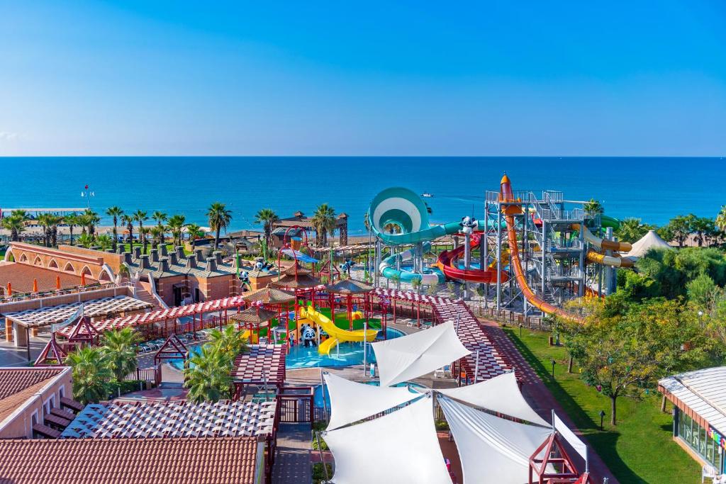 an amusement park with a roller coaster and a water park at Megasaray Club Belek in Belek