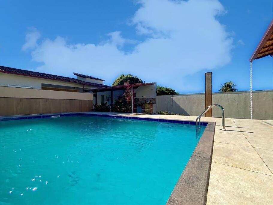 Bazén v ubytovaní Mar, Piscina, Diversão: Sua Casa de Praia - Meaipe alebo v jeho blízkosti