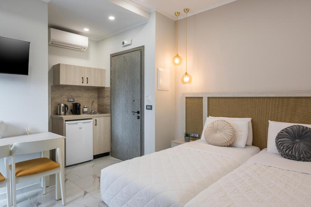 Kuchyň nebo kuchyňský kout v ubytování Alexia Seaview Apartments