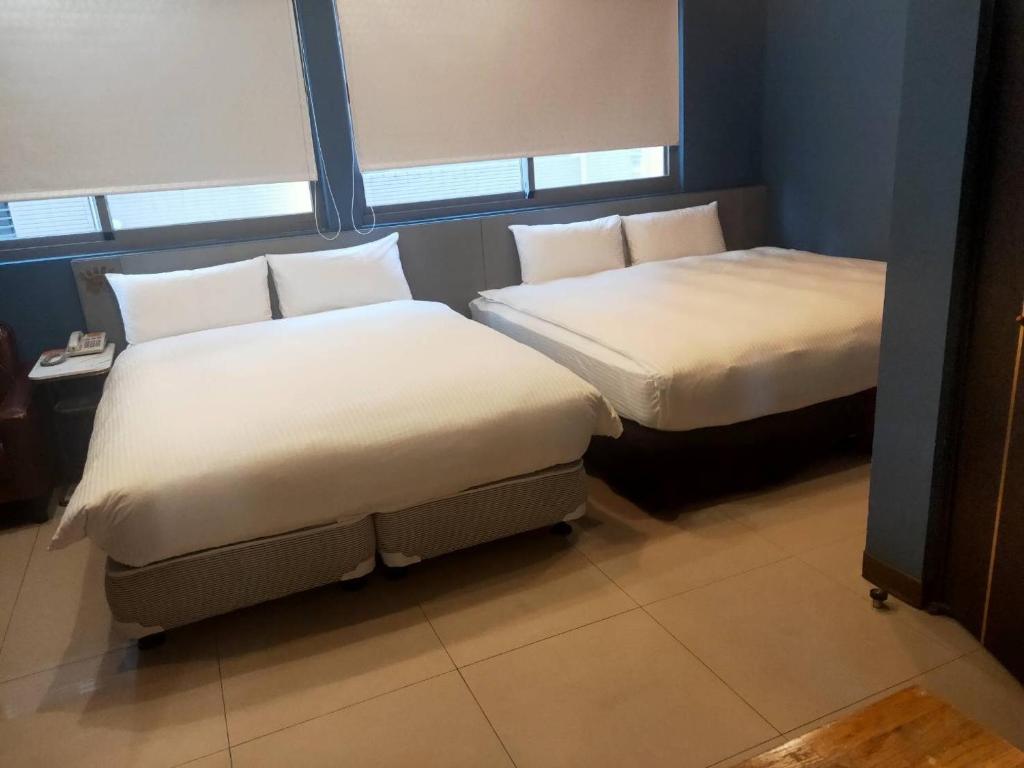 Postel nebo postele na pokoji v ubytování Bear Hotel
