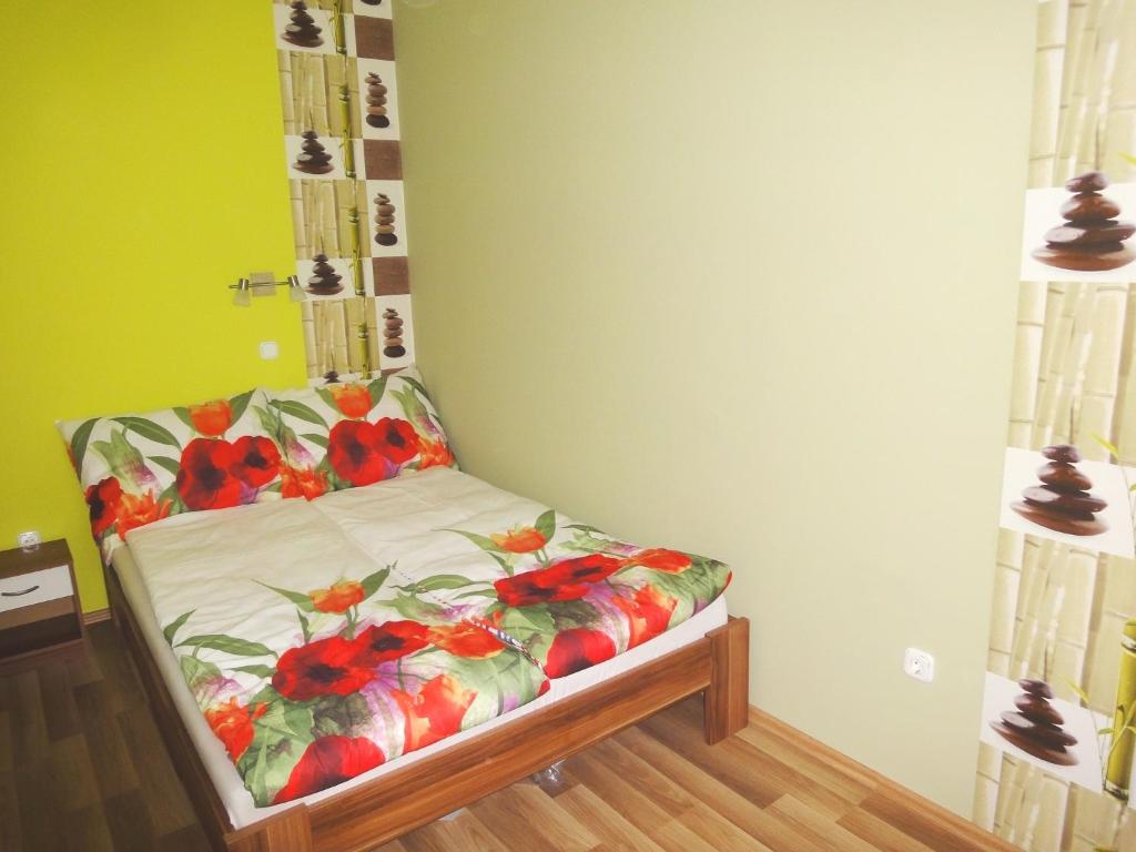 Postel nebo postele na pokoji v ubytování Aqua Apartmanok