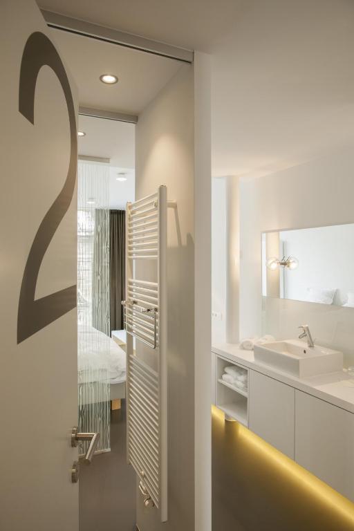 Postel nebo postele na pokoji v ubytování Hotel Muske Pitter