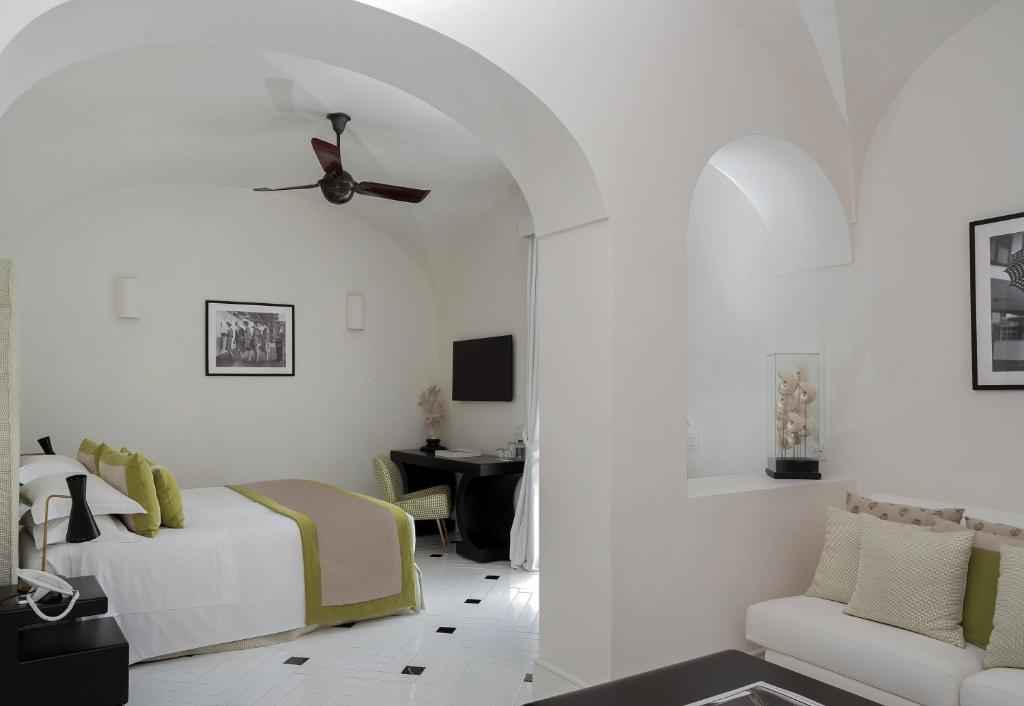 TV a/nebo společenská místnost v ubytování Hotel Miramalfi