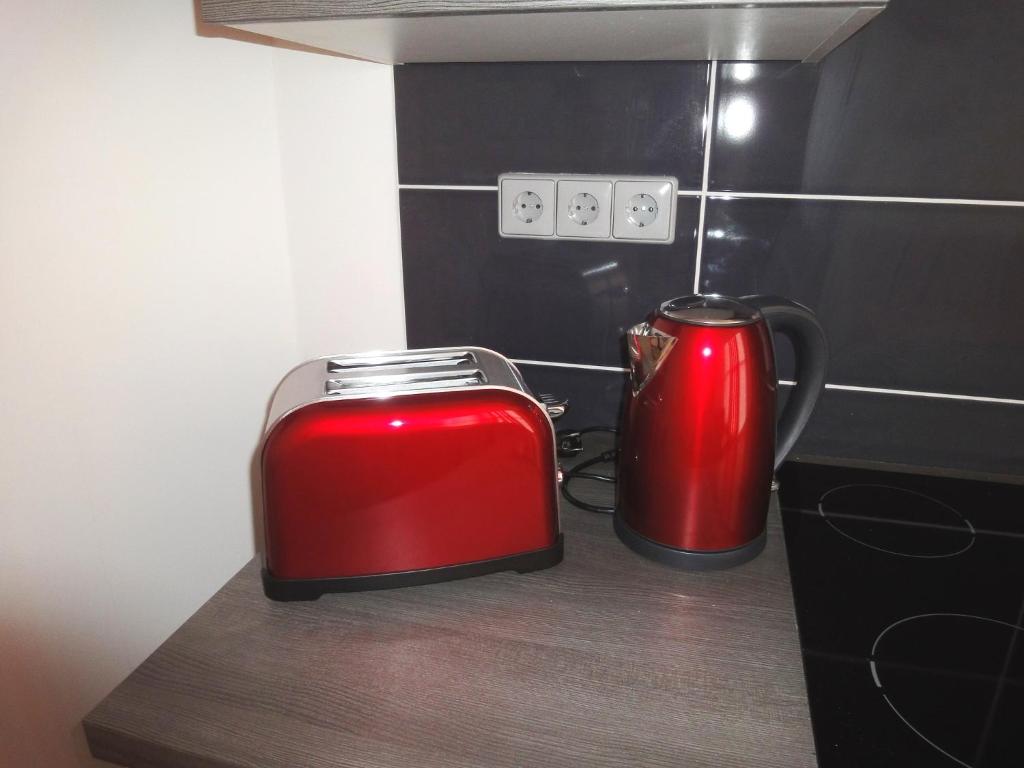 Kuchyň nebo kuchyňský kout v ubytování Aqua Apartmanok